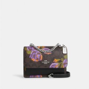 New Coach Mini Klare in signature Poppy print.